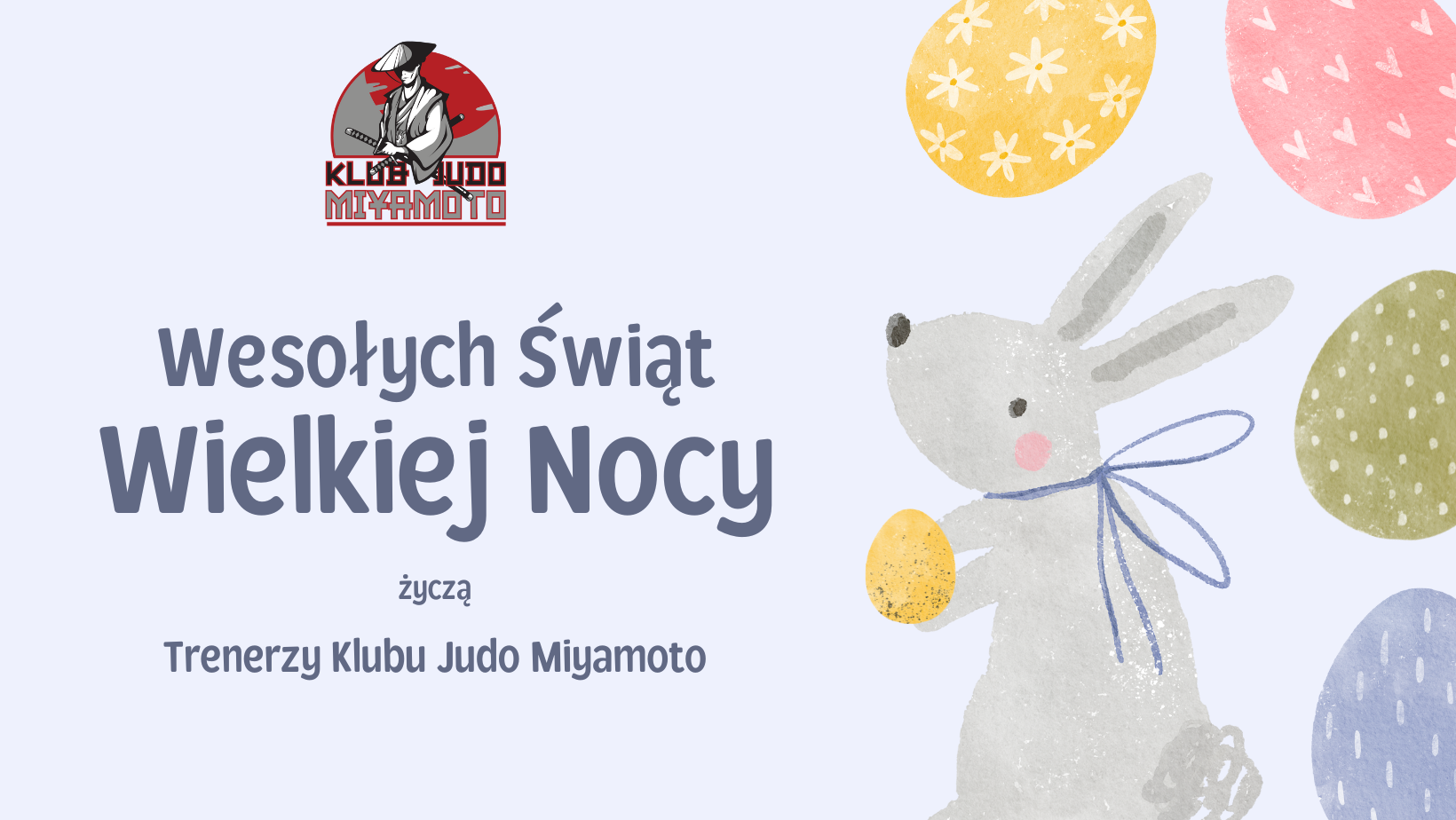 Logo klubu Miyamoto. Zajaczek i kolorowe pisanki. Tekst Wesołych Swiat Wielkiej Nocy życzą trenerzy Klubu Miyamoto.